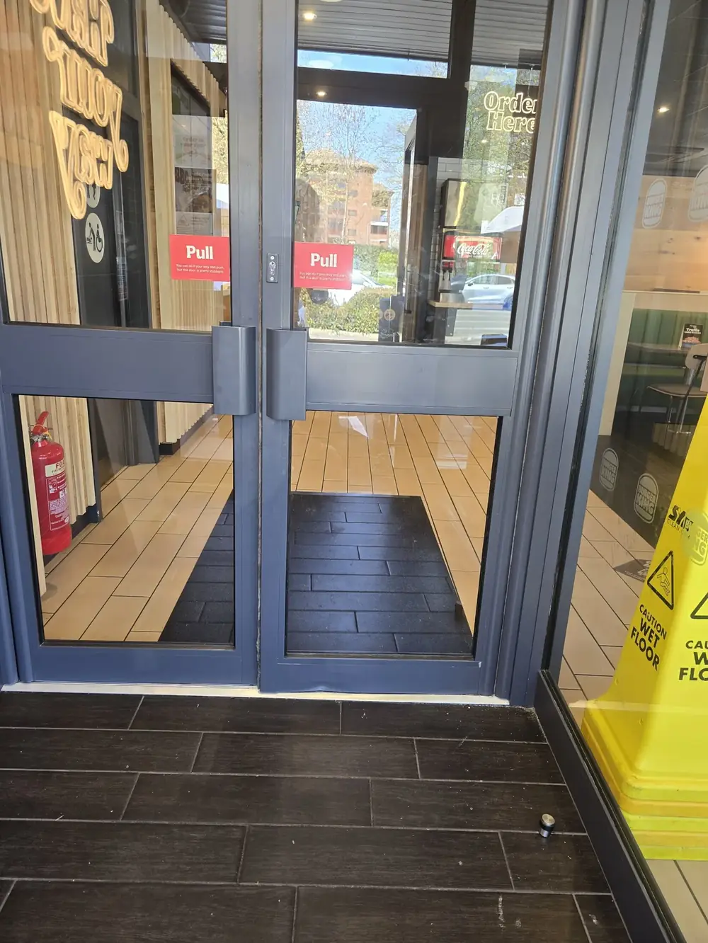 Aluminium entrance doors at a Burger King restaurant