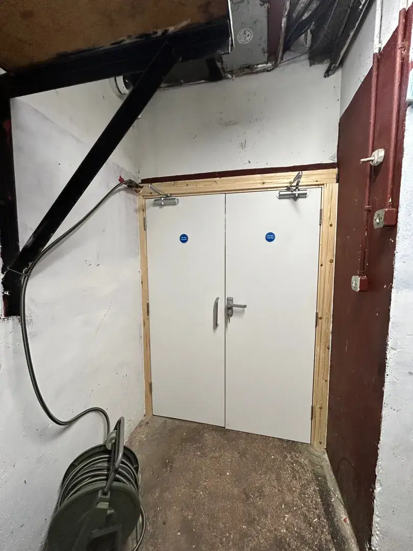 New pair of fire doors with overhead closers